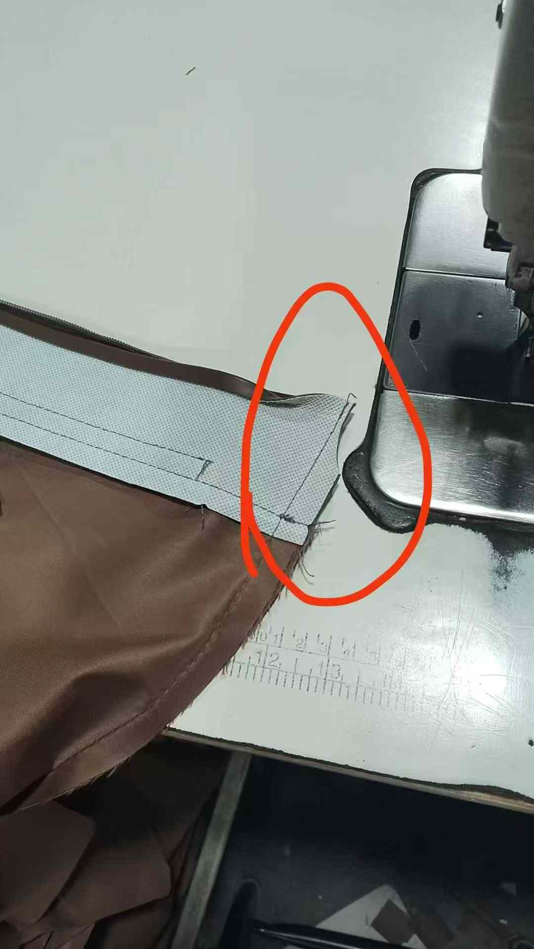 招手工修裡袋口边